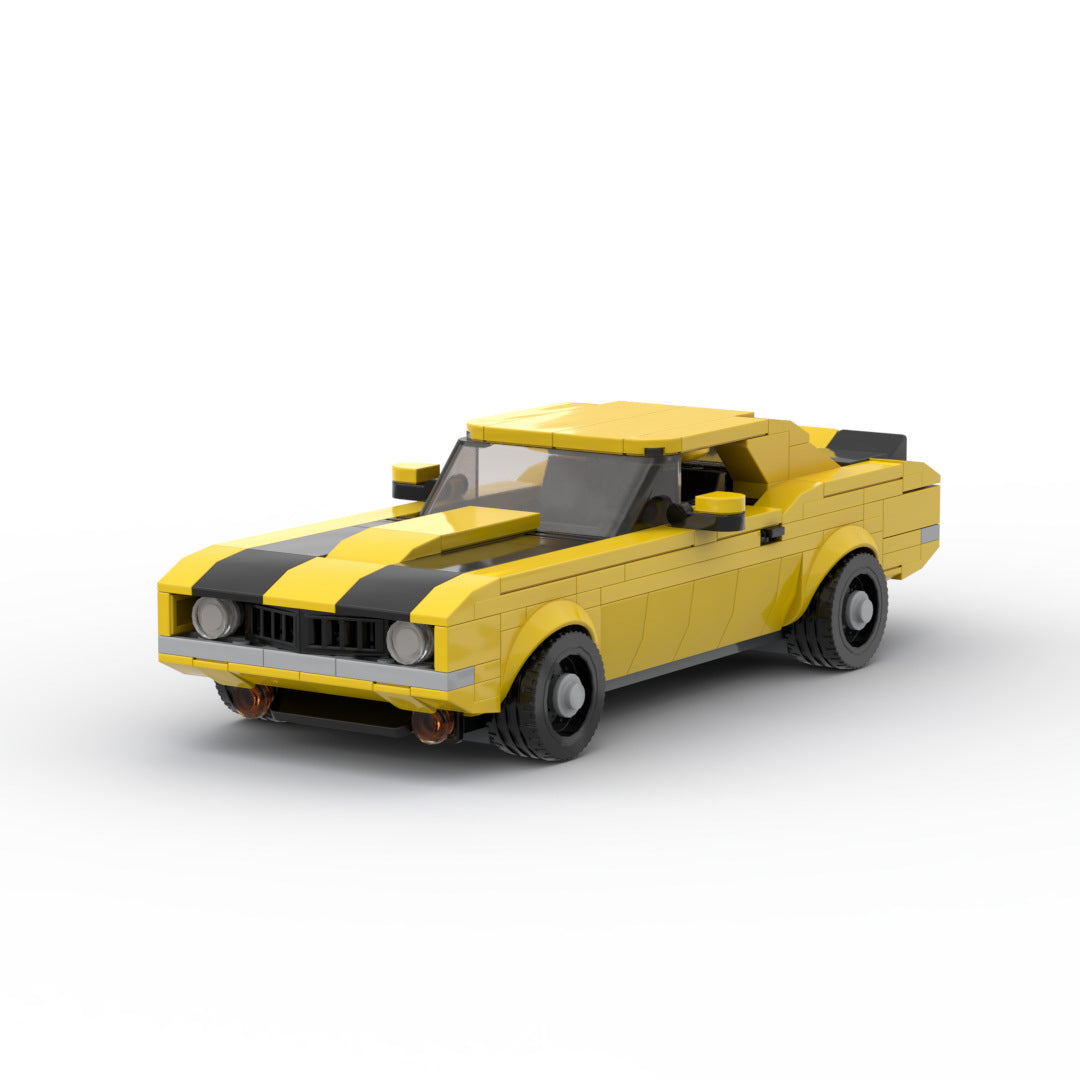 RevvBlox 1969 Chevrolet Camaro Z28 toy car model with detailed black and orange design and sleek racing style.