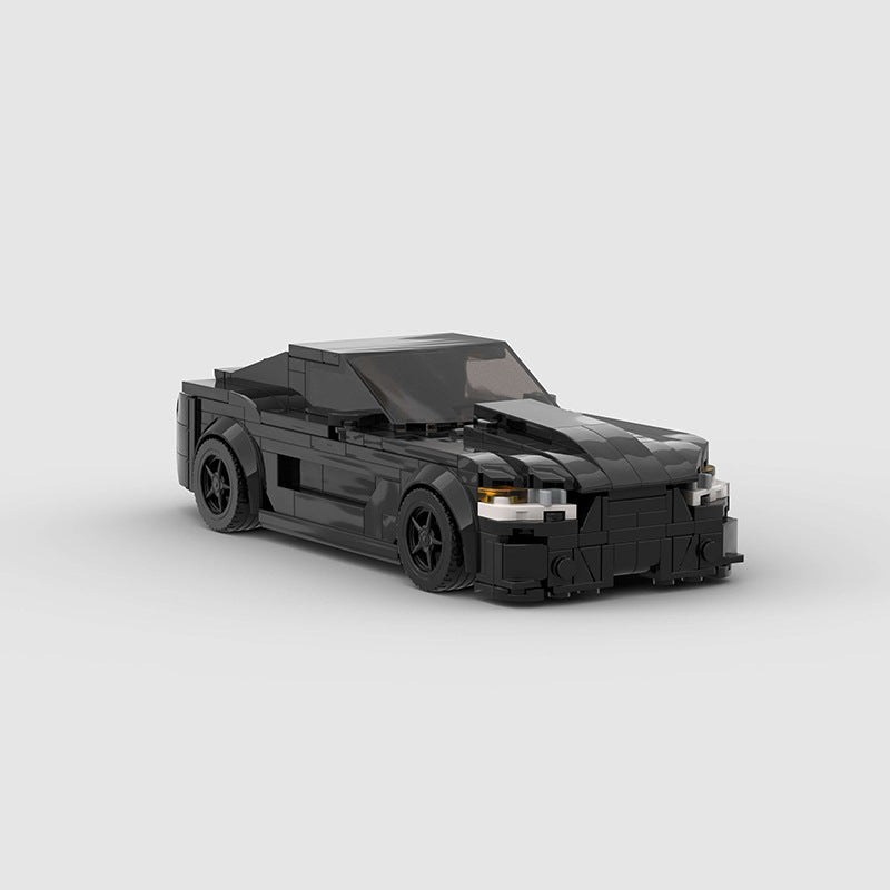 RevvBlox Fort Mustang GT500 building block toy set with detailed car model and vibrant red and black parts.