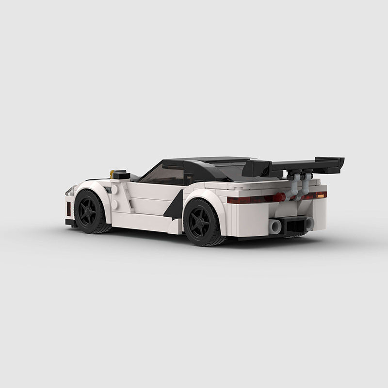 RevVBlox model of Mitsubishi GTO 3000GT sports car, detailed front view with sleek red and black design.
