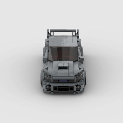 RevvBlox Subaru Impreza model car in blue with detailed exterior and realistic design, showcasing a miniature replica.