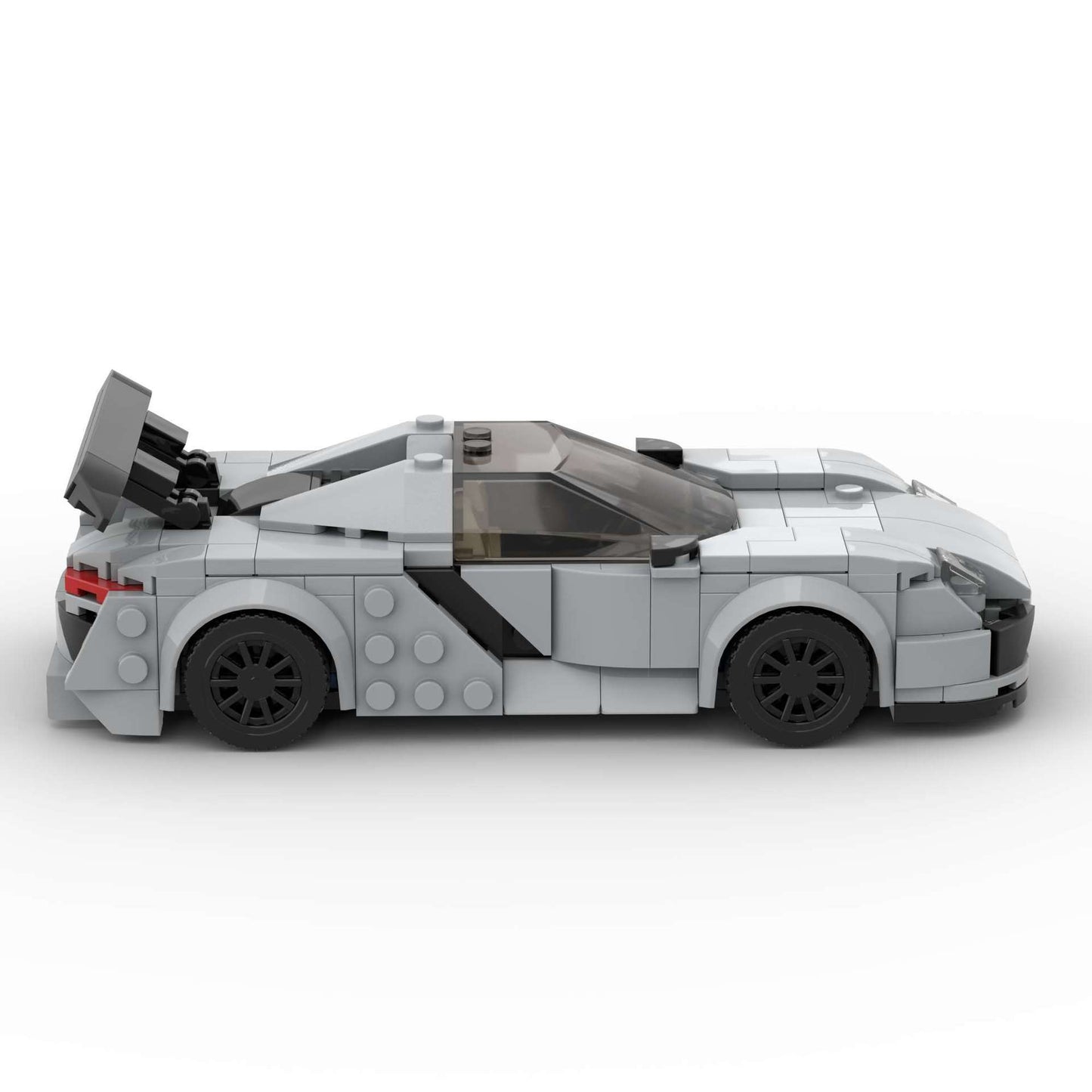 RevvBlox Porsche 918 Spyder model car with detailed body and vibrant paint, showcasing realistic design and intricate features.