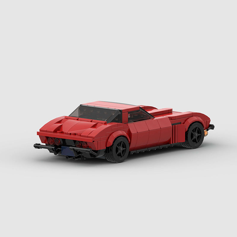 RevVBlox Corvette C2 Stingray model car with detailed body and vibrant red paint, showcasing classic muscle car design.