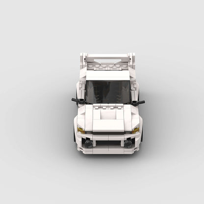 RevVBlox Mitsubishi Lancer Evolution Gen V scale model car with detailed exterior and racing-inspired design.