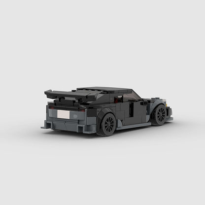 RevvBlox Tesla Model 3 Bionic toy car with detailed design and realistic features, shown on a white background.
