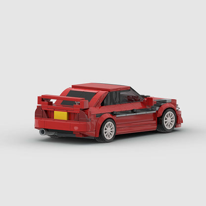 RevVBlox Mitsubishi Lancer EVO model car with detailed exterior and sporty design, shown from a side angle.