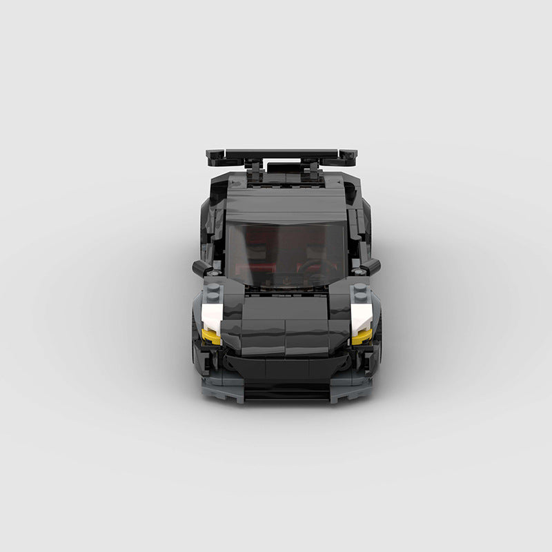 RevvBlox Tesla Model 3 Bionic toy car with detailed exterior and realistic features, displayed on a white background.