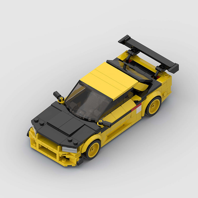 RevVBlox Nissan GT-R R34 model car with detailed blue body and black wheels, showcasing realistic design and craftsmanship.