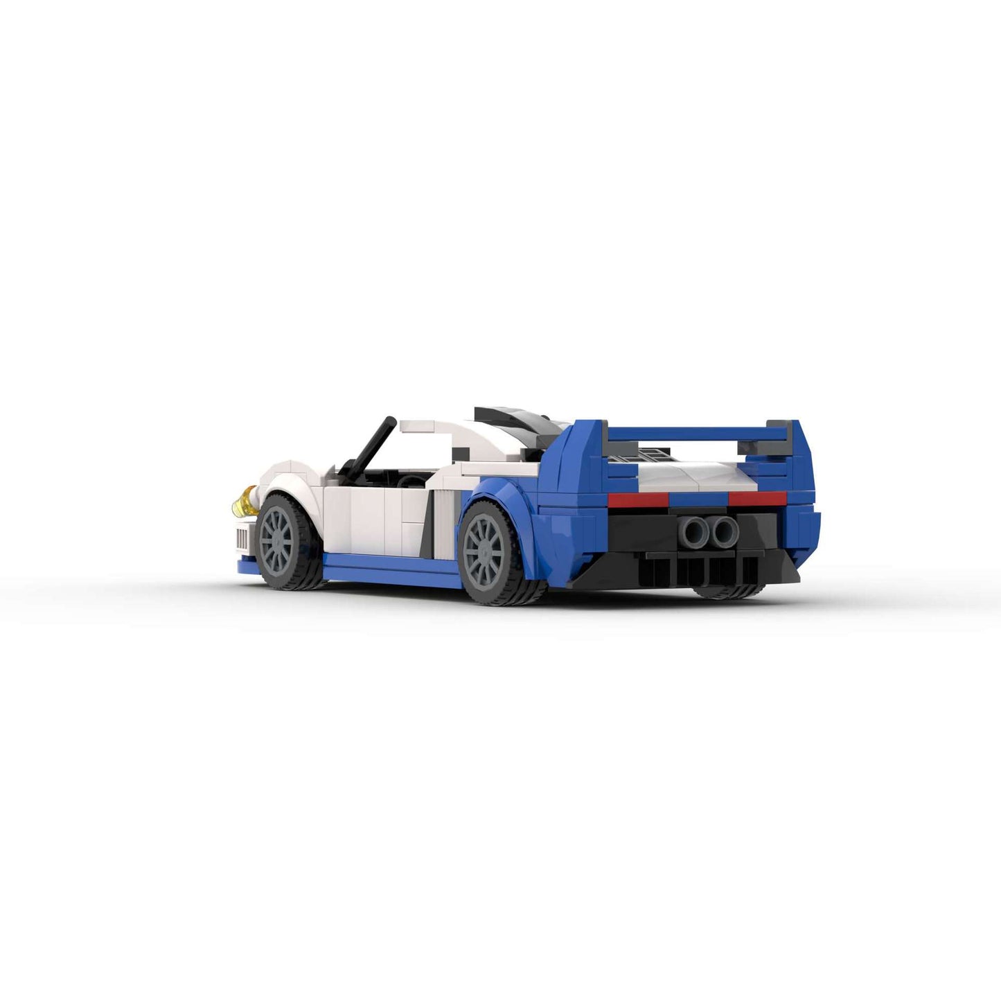 RevvBlox Maserati MC12 model car in blue with detailed exterior, showcasing sleek sports car design and intricate craftsmanship.