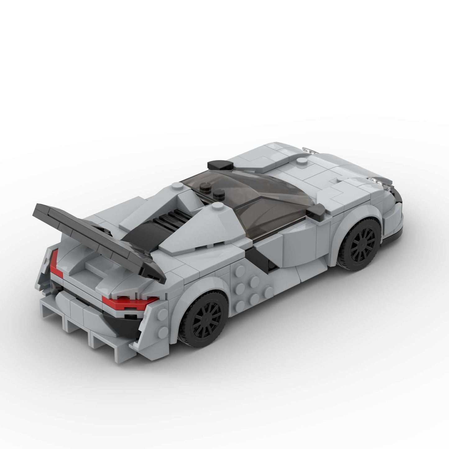 RevVBlox Porsche 918 Spyder diecast model car with detailed features and sleek silver exterior.