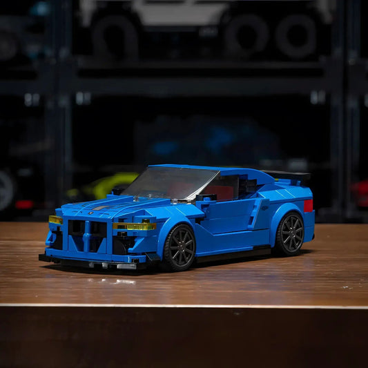 RevvBlox BMW M14 model showcasing sleek design and detailed features in a dynamic angle.