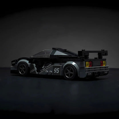 McLaren F1 model by RevvBlox, showcasing sleek design and detailed features in vibrant colors.