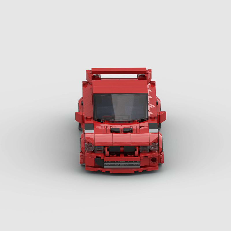 RevvBlox Mitsubishi Lancer EVO diecast model car with detailed exterior and sporty design, displayed on a plain background.