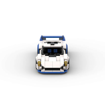 RevvBlox Maserati MC12 model car in red with detailed exterior and racing design, showcasing a collectible scale model.