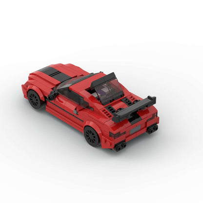 RevvBlox BMW M8 model car in detailed red and black design, showcasing realistic features and sleek exterior.