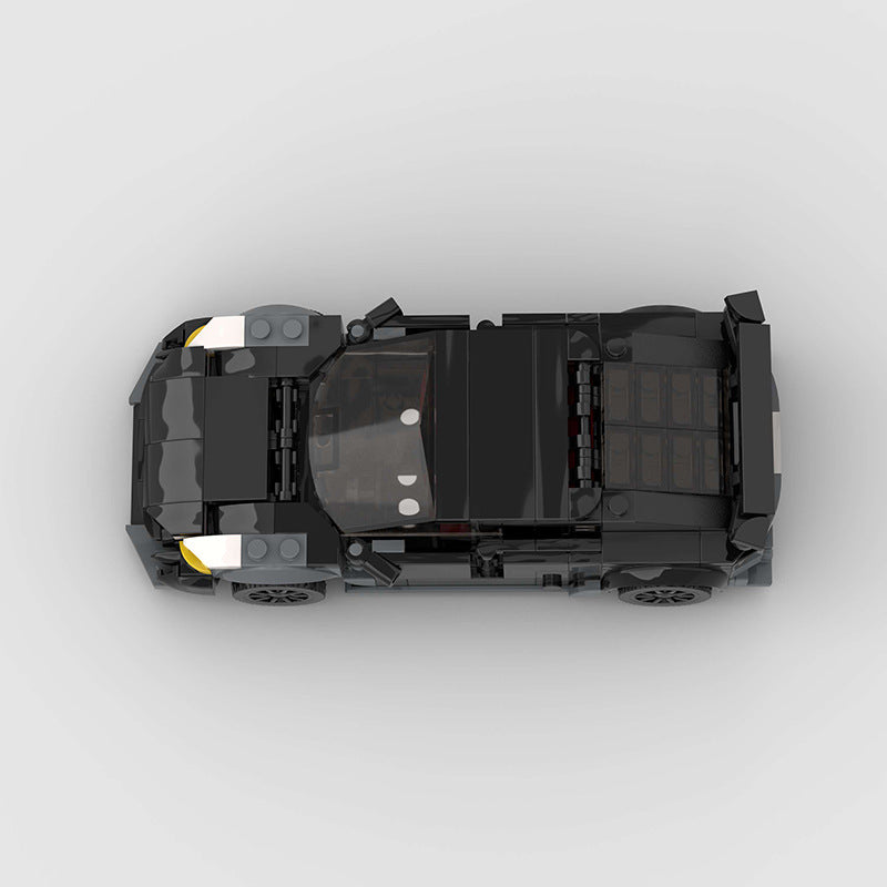 RevvBlox Tesla Model 3 Bionic toy car with detailed blue and black design, realistic features, and sleek exterior.