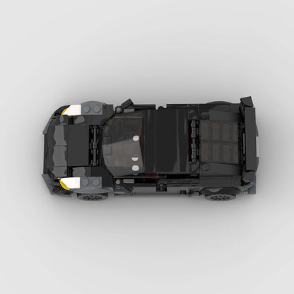 RevvBlox Tesla Model 3 Bionic toy car with detailed blue and black design, realistic features, and sleek exterior.