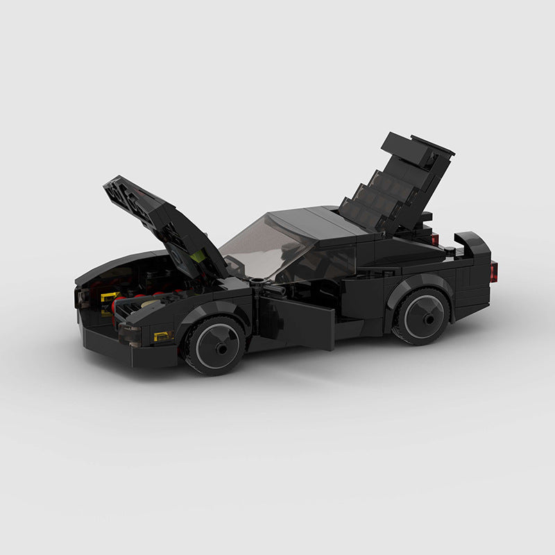 RevVBlox Night Rider toy car in black with sleek design, featuring detailed wheels and aerodynamic body for imaginative play.