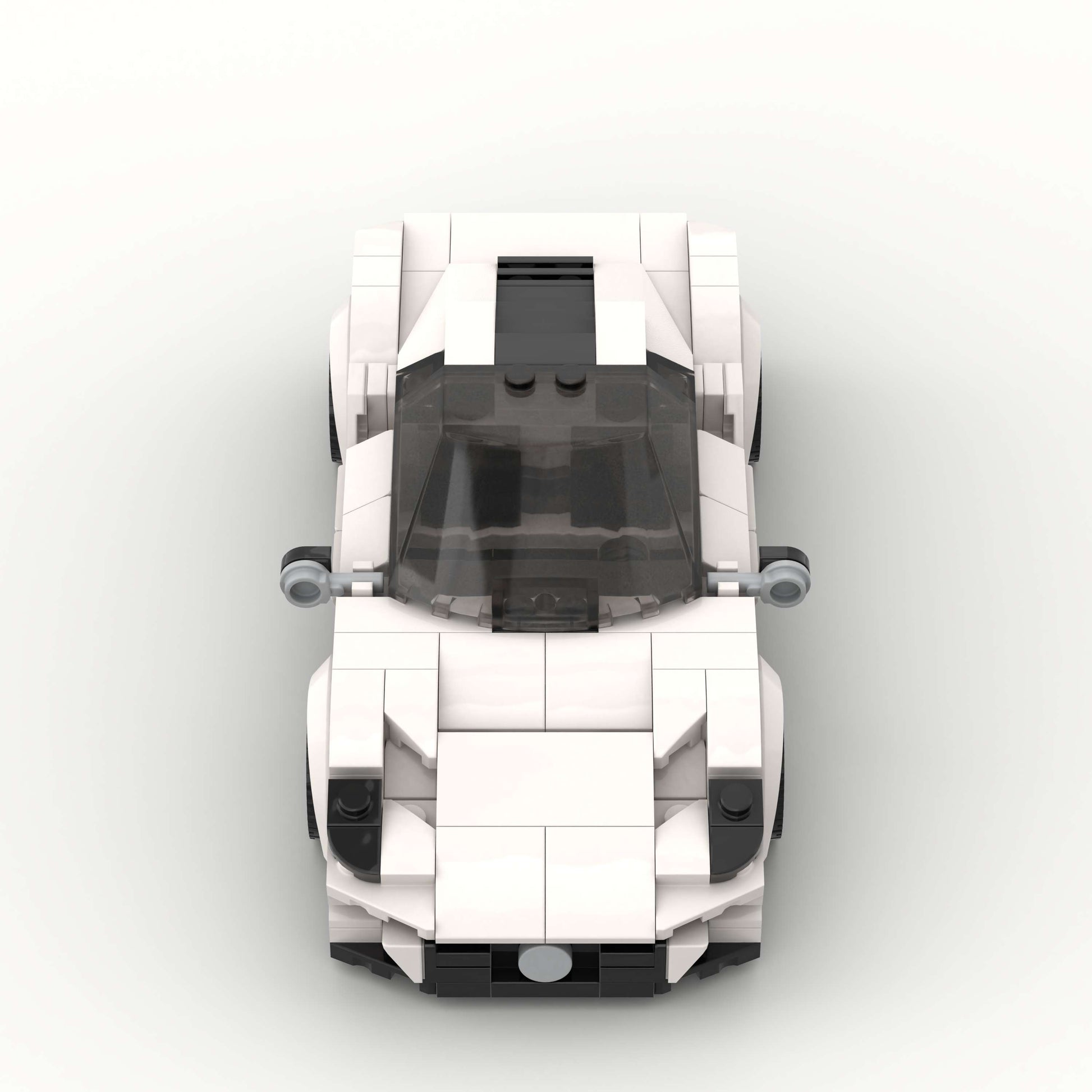 RevVBlox Maserati MC20 toy car model with detailed design and sleek black finish, perfect for collectors and enthusiasts.