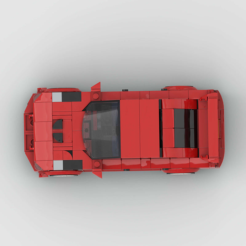 RevVblox Mitsubishi Lancer EVO model car with detailed red and black paint finish, showcasing realistic design and sporty features.