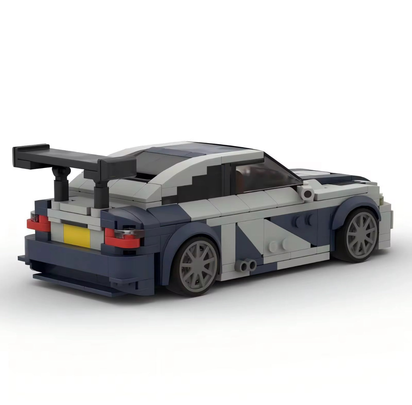 BMW M3 GTR E46 model by RevvBlox, showcasing detailed design and vibrant colors in a dynamic angle.