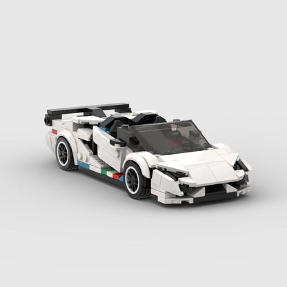 Revvblox Lamborghini Aventador SVJ Roadster diecast model showing red exterior, detailed interior, and sleek sporty design.