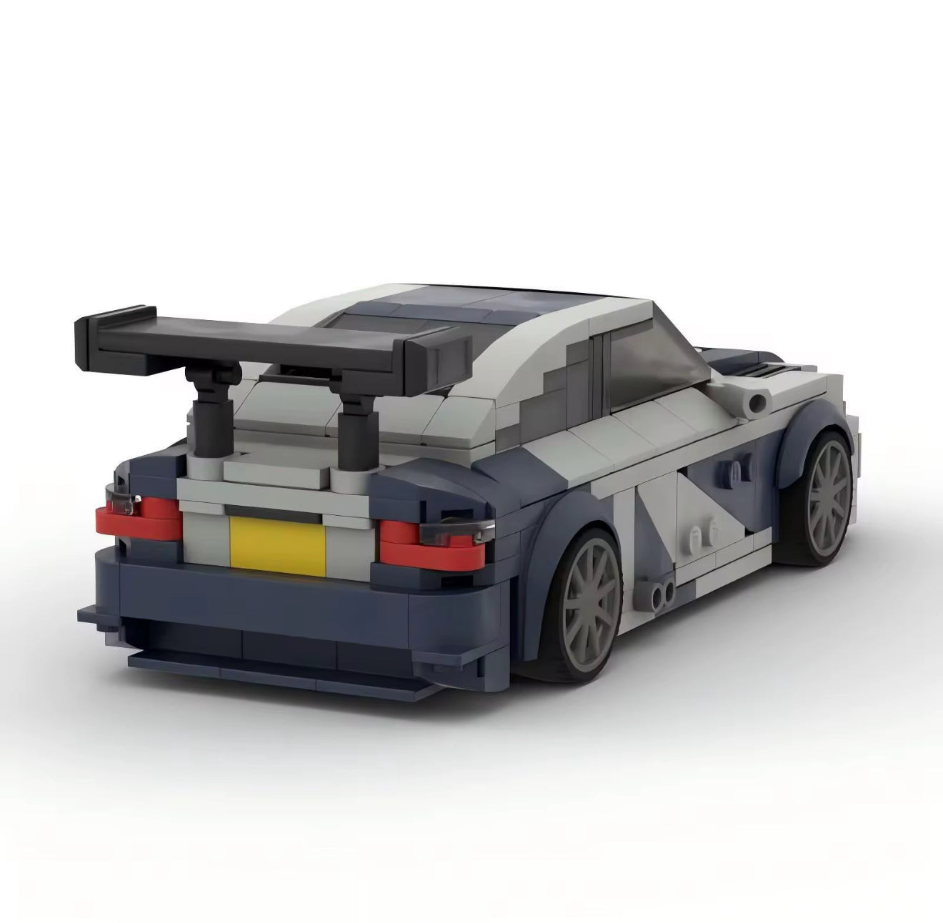 BMW M3 GTR E46 model by RevvBlox, showcasing detailed design and iconic racing features in vibrant colors.