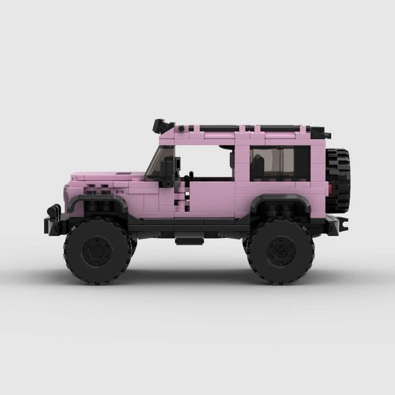 Pink edition RevvBlox Jeep Wrangler toy vehicle, detailed replica with realistic features and rugged design.