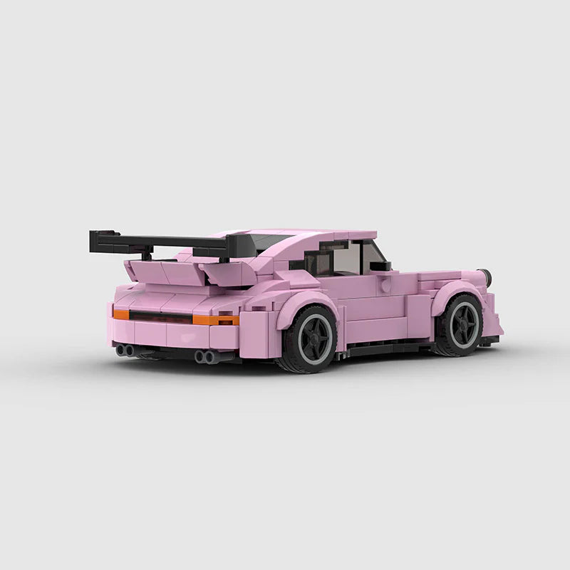 RevBlox Porsche 911 RWB Pink Edition diecast model car on a white background, showcasing detailed exterior and vibrant pink paint.