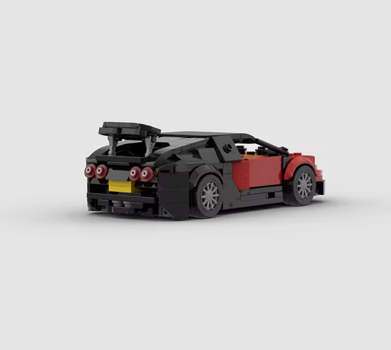 RevvBlox Bugatti Veyron toy brick model showcasing detailed blue and black design, assembled from colorful building blocks.