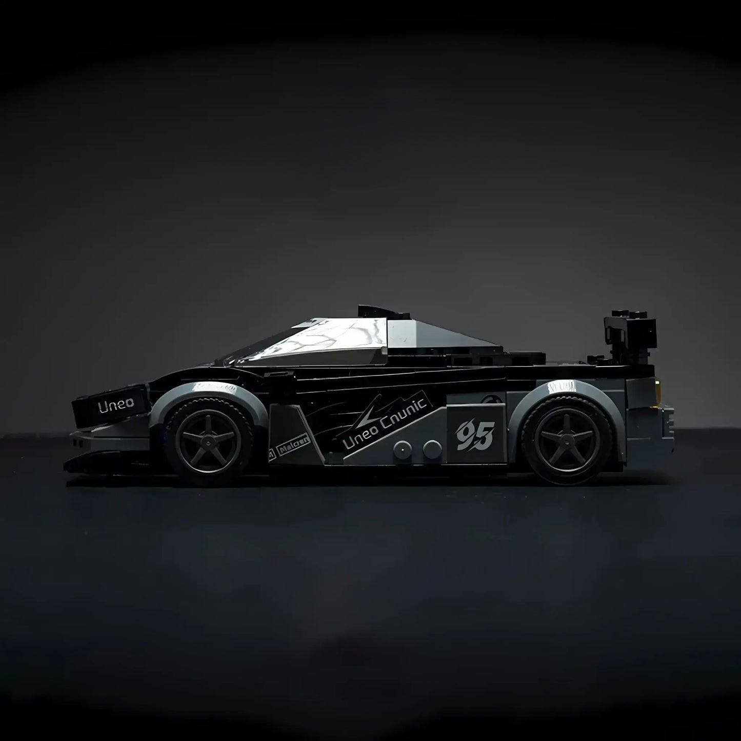 McLaren F1 model car by RevvBlox, showcasing sleek design and detailed features in vibrant colors.