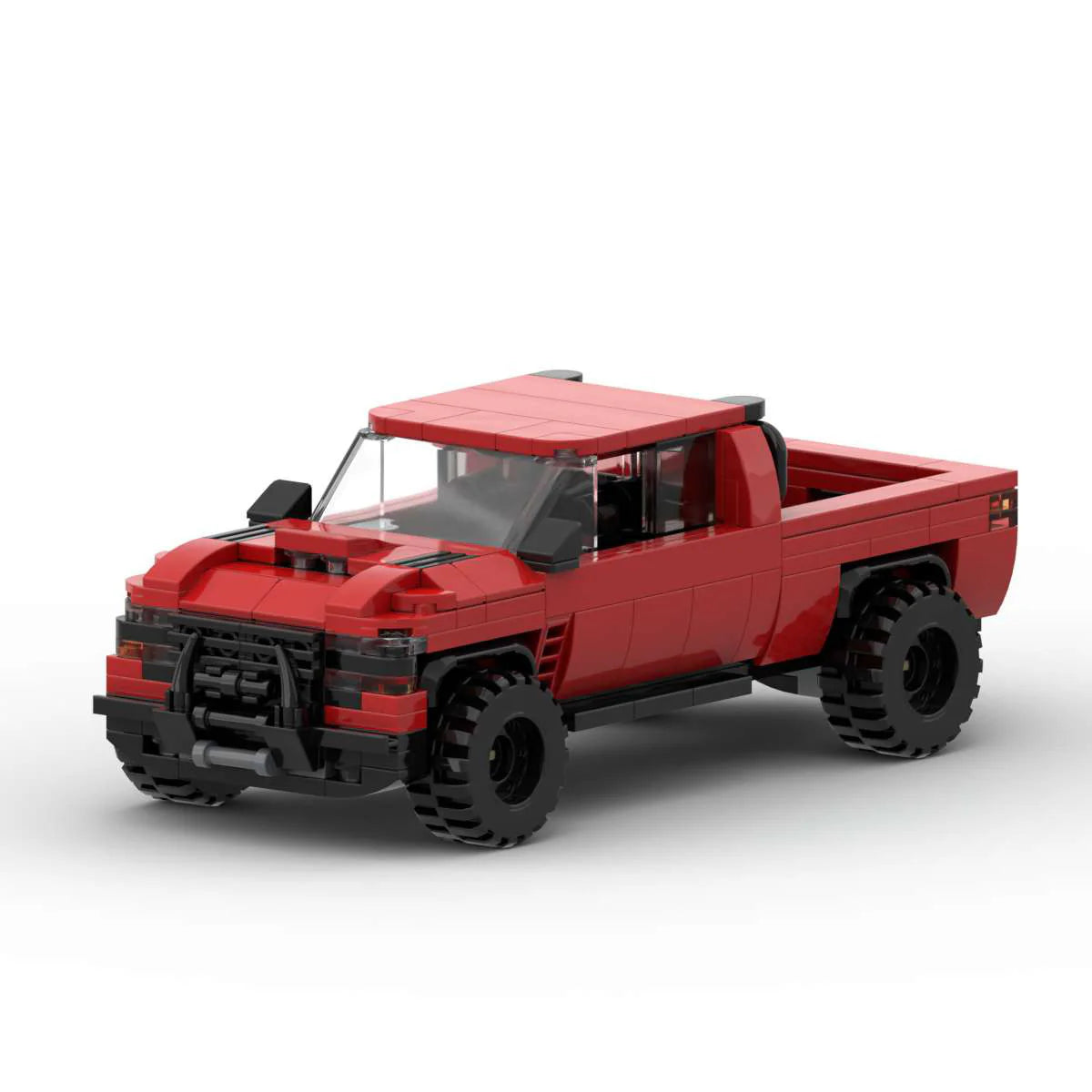 RevvBlox Dodge Ram model toy in gray with detailed truck features, front grille, and realistic design.
