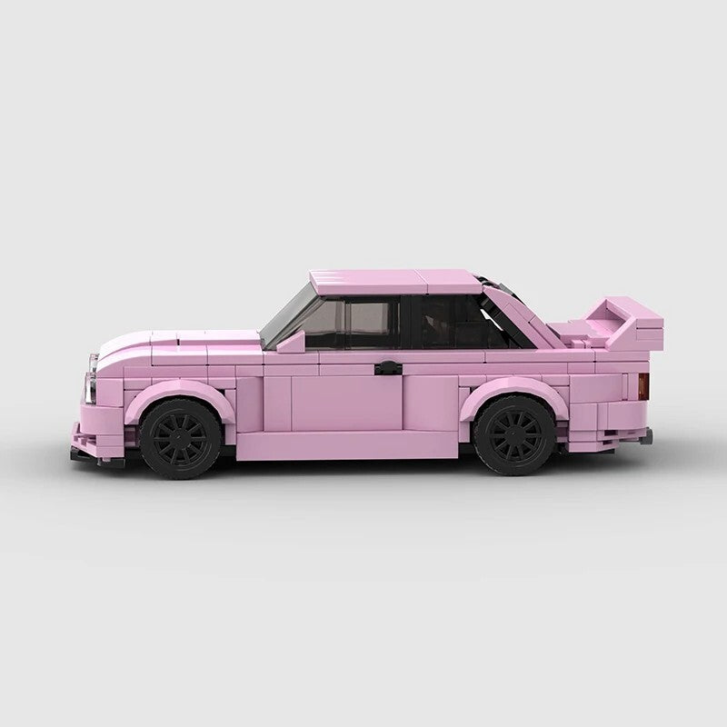 RevVBlox BMW M3 E30 model car, detailed die-cast replica with black exterior, showcased on a plain background.