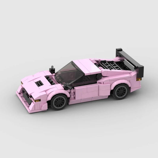 Pink edition BMW M1 RevvBlox model car with detailed exterior and sleek design, showcasing a collectible die-cast vehicle.
