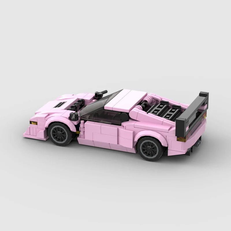 Pink BMW M1 RevvBlox model car on display, detailed miniature sports car with pink finish and realistic features.