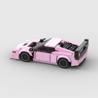 Pink BMW M1 RevvBlox model car on display, detailed miniature sports car with pink finish and realistic features.
