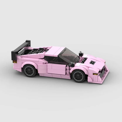 Pink edition BMW M1 RevvBlox brick model car, detailed miniature replica with realistic features and vibrant pink color.