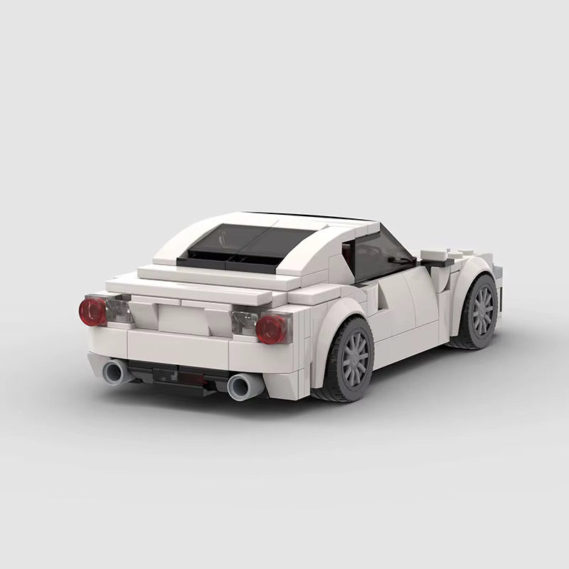 RevVBlox Toyota GT86 toy model car with detailed blue exterior and realistic design, showcasing the sporty coupe's features.