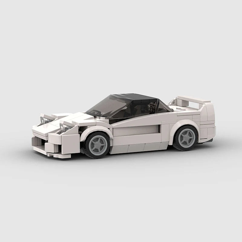 RevVBlox Honda NSX model car in vibrant orange with detailed exterior and sleek design, displayed on a clean background.