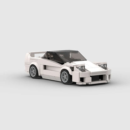 RevVBlox Honda NSX model car in blue with detailed exterior and interior features, showcasing a sleek, realistic design.