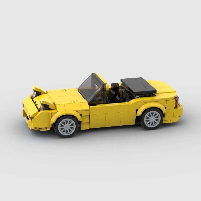 RevvBlox Mazda Miata MX-5 model car featuring detailed exterior and interior design, displayed on a neutral background.