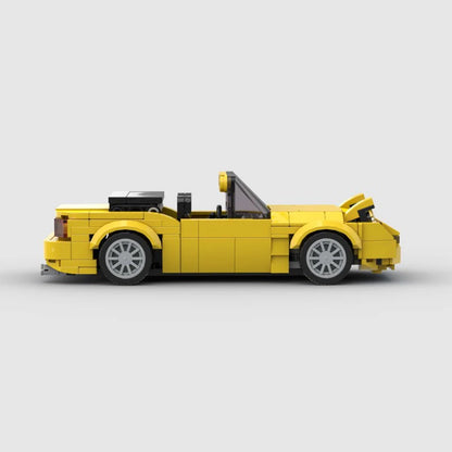 RevvBlox Mazda Miata MX-5 model car with detailed exterior and interior features, showcasing its sleek design and sporty look.