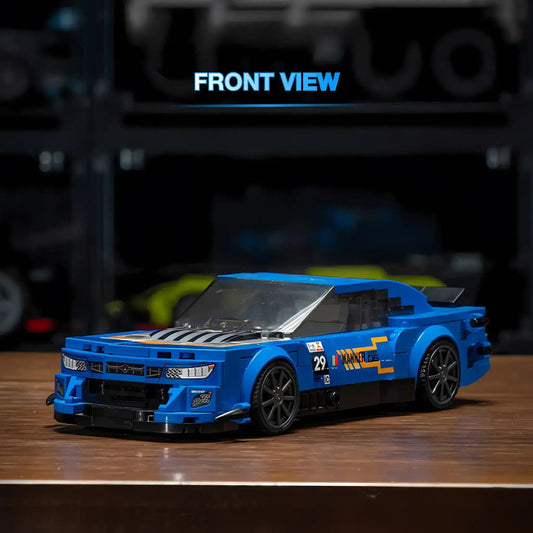 RevvBlox Chevrolet Camaro Garage 56 toy model in black with detailed features on a white background.