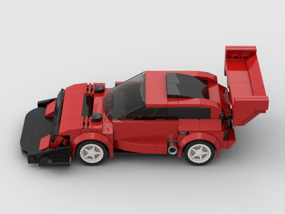 RevVBlox Suzuki Escudo Pikes Peak edition scale model car, detailed silver and black design with racing decals.