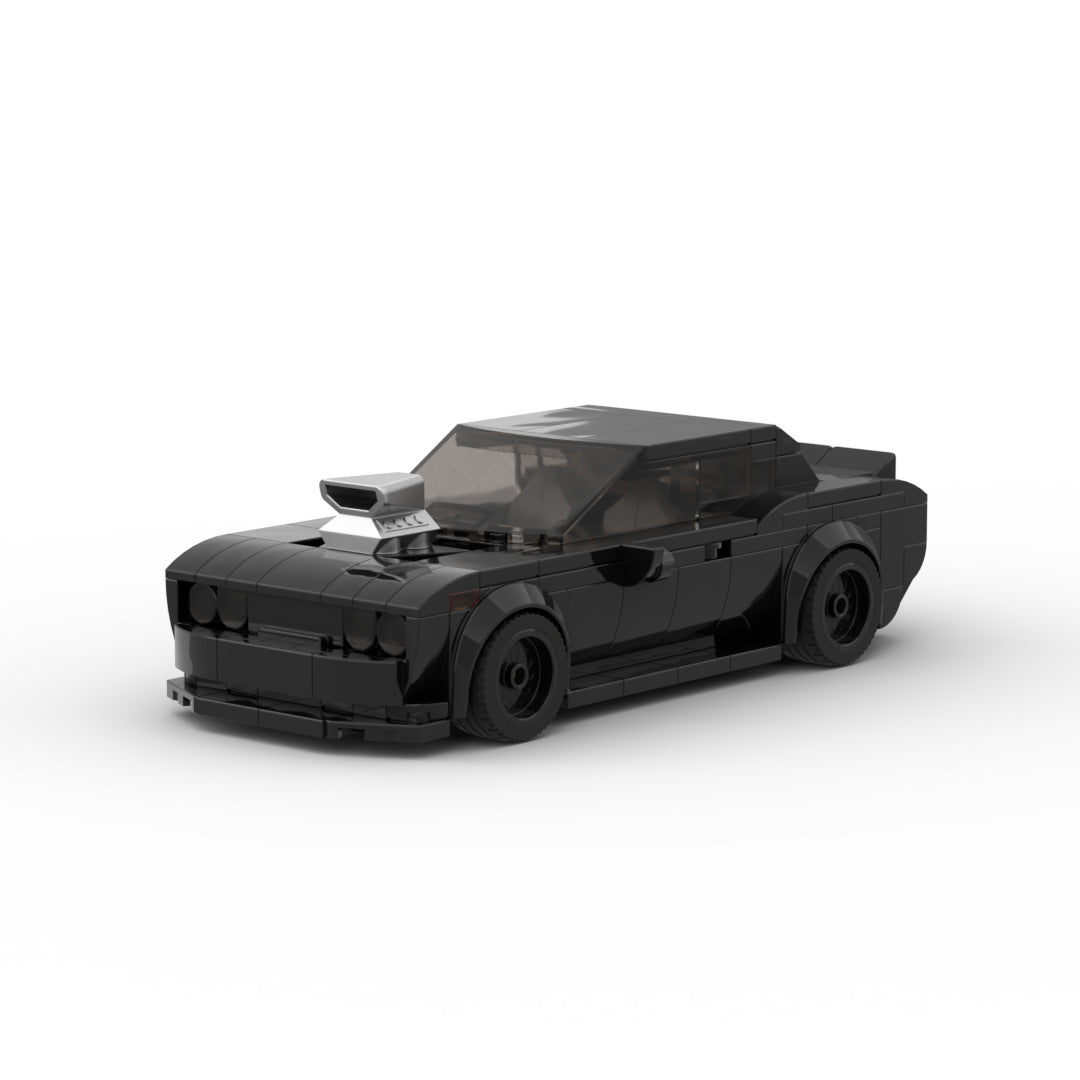 Black LEGO muscle car model with large hood scoop and tinted windows on white background